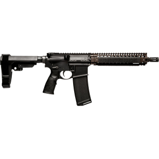 Side profile of a black AR-style rifle with collapsible stock, Picatinny rails, and a detachable magazine