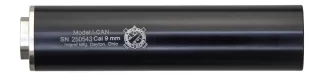 Black cylindrical firearm suppressor with a silver ring at the end and engraved text, including 'Modell CAN' and 'Cal 9 mm'