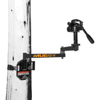 Post-mounted manual crank device attached to a wooden pole, with orange 'MUDDAY' label on the arm.