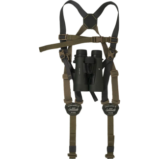 Olive-drab tactical chest harness with a pair of black binoculars mounted in the center and adjustable straps on the shoulders and waist.