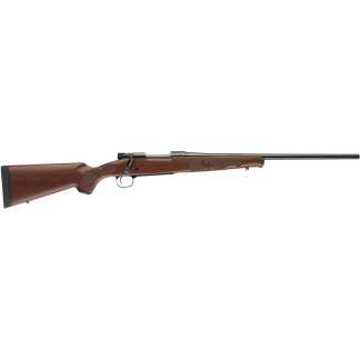 Bolt-action rifle with a wooden stock and long black barrel, shown in side view
