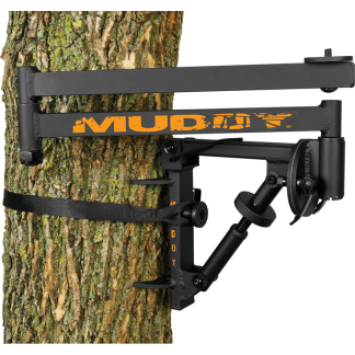 MUDDY tree stand strapped to a tree trunk, ready for use in hunting or surveillance equipment.