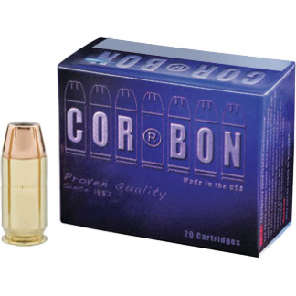 Box of Corbon ammunition with a single brass cartridge standing upright beside it.