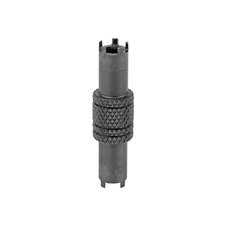 Cylindrical metal electrical connector with a knurled midsection and slotted ends.