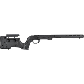 Black modular rifle chassis with stock and long barrel, shown in a right-side profile.