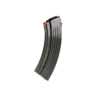 Curved black rifle magazine with orange follower at the top, angled on a white background.