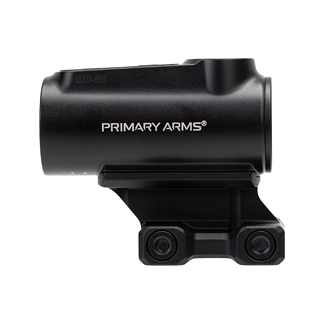 Black Primary Arms red dot sight mounted on a firearm mount/rail, a compact optic designed for aiming.
