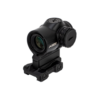 Black riflescope/red dot sight with a mounting rail clamp, shown from an angled view.