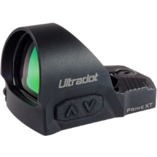 Compact black red dot sight with a green-tinted lens, labeled Ultradot Prime XT, for aiming on a firearm