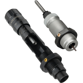 Pair of modular precision connectors with threaded bodies and locking collars: a black component featuring a spiral dial scale, and a silver knurled connector with a gold-set screw, used to secure and couple cables or devices.