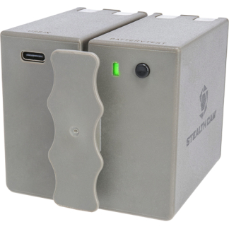 Stealth Cam dual-module trail camera unit with a green indicator light and USB-C port on the left.