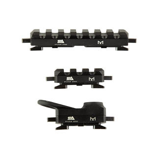 Three black model railroad couplers lined up on a white background, shown from the side.