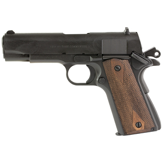 Side view of a semi-automatic pistol with a dark metal slide and brown wooden grip panels on a white background, facing left.