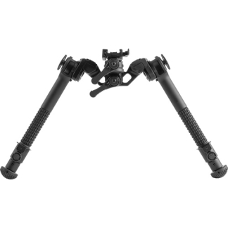 Compact black photography tripod with adjustable legs spread wide and a mounted camera head at the top.
