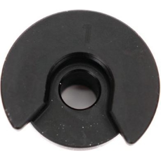Black circular plastic component with two notches and a central hole (washer-like spacer).