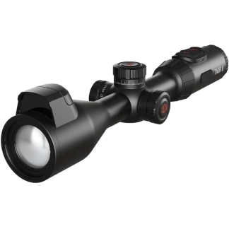 Black rifle scope with a large objective lens and multiple adjustment knobs visible (matte black).