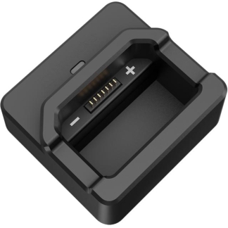 Black battery charging dock with a recessed slot and gold contact pins for a rechargeable battery (positive and negative terminals visible).