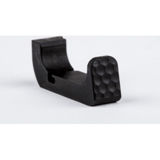 Black plastic L-shaped clip with a hexagonal-textured end face.