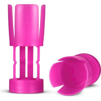Bright pink plastic kitchen gadget set: a cylindrical corer/slicer with vertical slots and a matching cap.