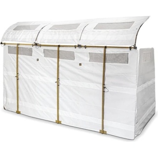 Portable white greenhouse with arched, translucent roof panels and brown vertical supports; side doors and small vent windows on the sides.