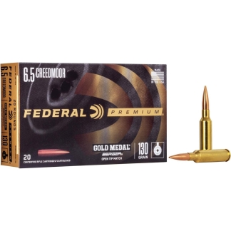 Box of Federal Premium Gold Medal 6.5 Creedmoor rifle cartridges, 130 grain, with two rifle bullets beside it.