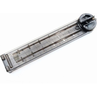 Clear plastic pistol magazine with the internal spring and follower visible inside the transparent body.