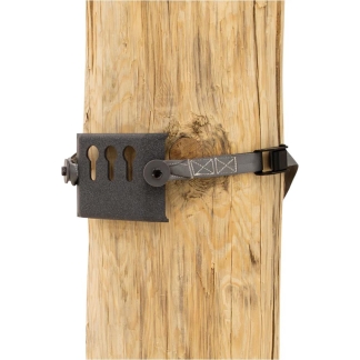 Metal strap bracket fastened around a rough wooden post, with a rectangular perforated plate and an adjustable buckle.