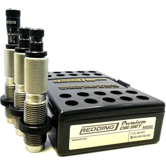 Redding Premium die set with knurled reloading dies beside a black storage box labeled 'Redding Premium Die Set'.