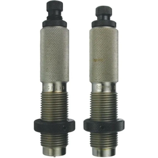 Pair of knurled metal valves with threaded bodies and black caps for adjustable flow control in industrial settings.