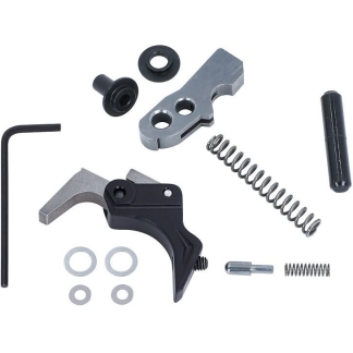Assorted bicycle brake lever repair kit parts, including a silver lever, black housing, coil springs, washers, pins, and an hex key.