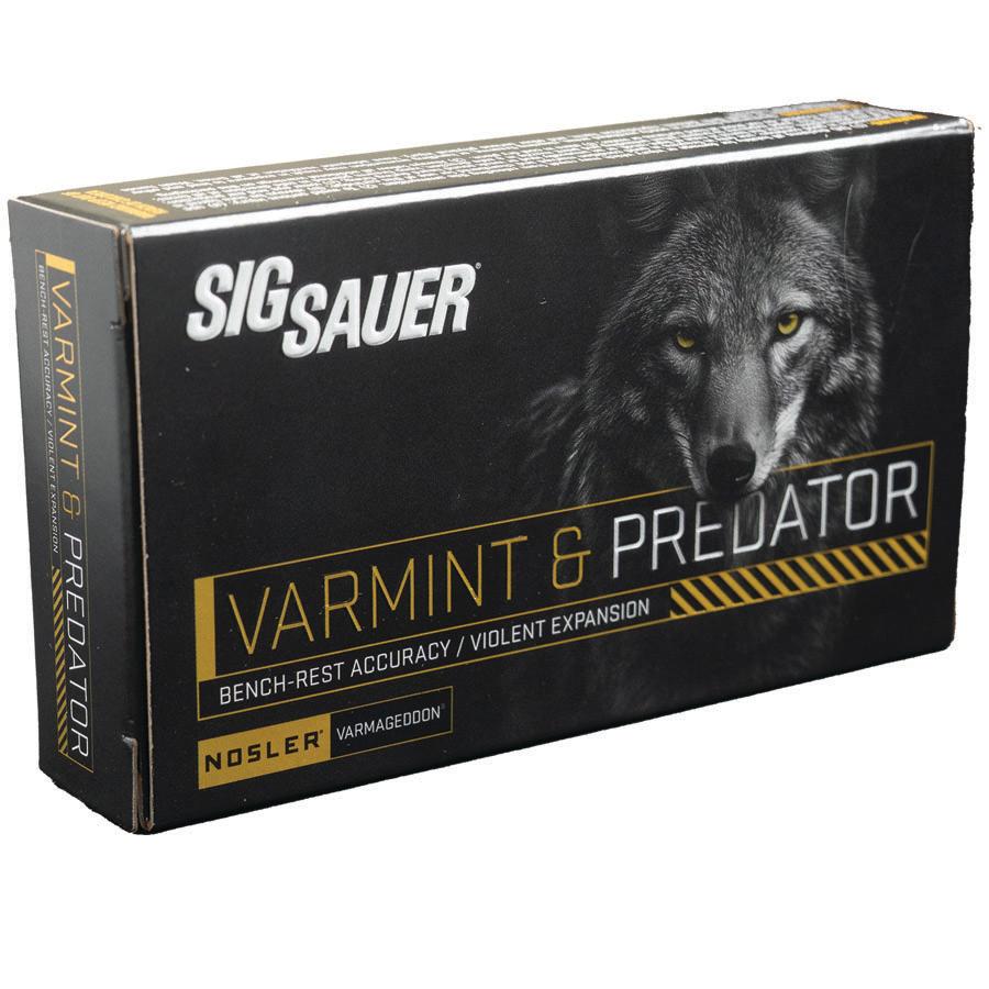 Box of SIG Sauer Varmint & Predator ammunition with a gray wolf on the front and bold yellow lettering.