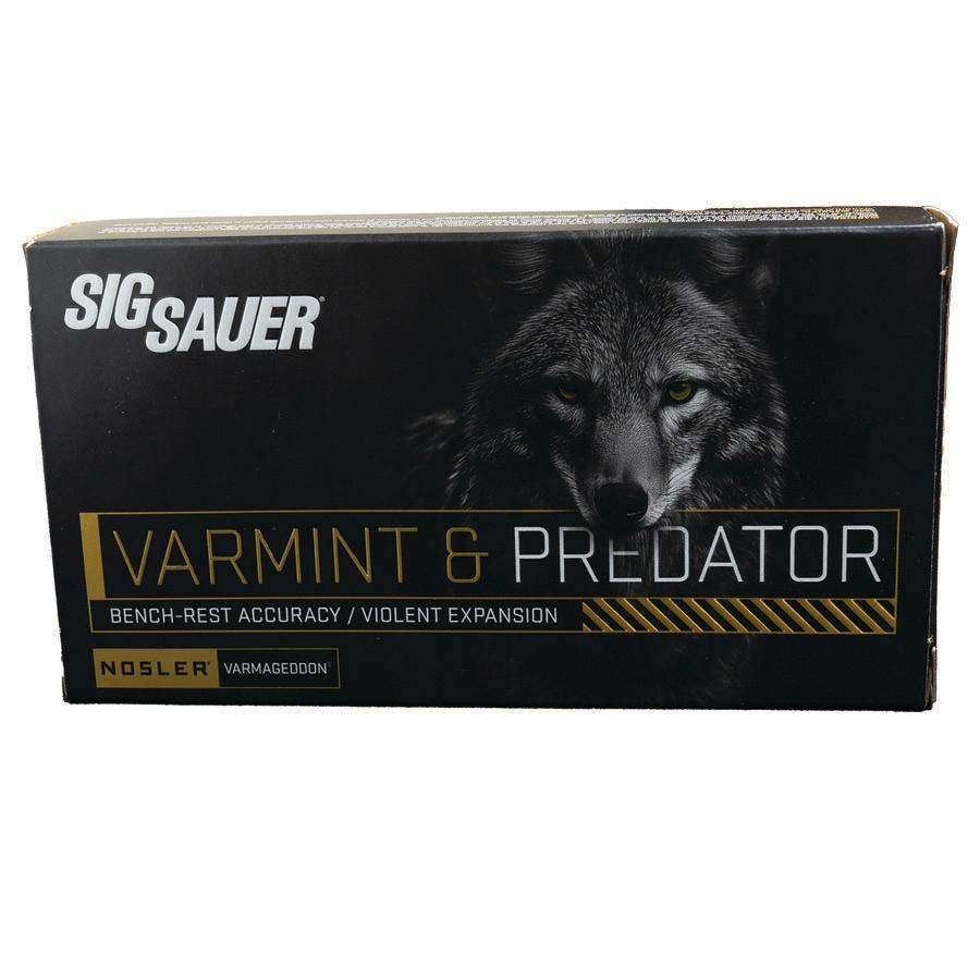 Box of SIG SAUER Varmint & Predator ammunition featuring a snarling wolf image and gold typography on a black background, highlighting the product name.