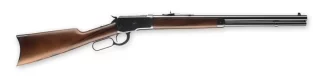 Lever-action rifle with a wooden stock and long metal barrel shown from the side on a white background.