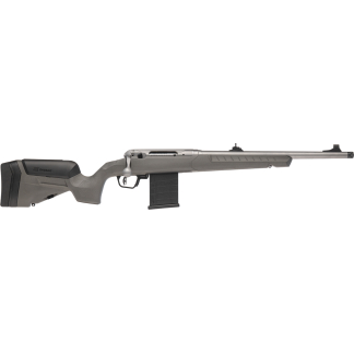 Bolt-action rifle with gray synthetic stock, detachable magazine, and long stainless barrel seen from the side; Savage branding on the stock.