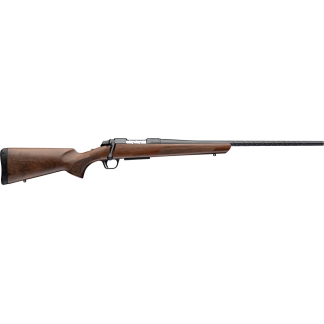 Side view of a hunting shotgun with walnut stock and long blue barrel