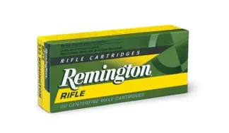 Box of Remington rifle cartridges with green and yellow packaging, labeled 'Remington Rifle' and '20 centerfire rifle cartridges'