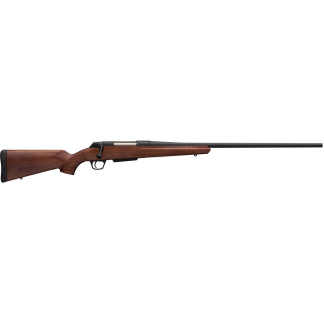 Bolt-action rifle with wooden stock and long black barrel shown in a left-side profile view, ready for use in hunting or sport shooting.