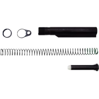 Assorted disassembled mechanical parts: two rings, a black cylindrical housing, a long coil spring, and a small black end piece with a white tip.