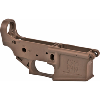 Brown AR-style rifle lower receiver with trigger slot and magazine well visible.