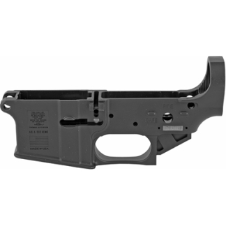 Gray metal AR-15 lower receiver shell shown from the side, featuring the trigger pocket, magazine well, selector area, and cutouts for uppers and components.