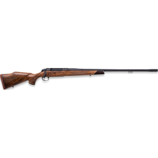 Bolt-action rifle with a polished wooden stock and long dark metal barrel used for hunting or sport shooting.