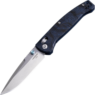 Close-up of a blue patterned folding knife handle with a silver blade partially extended, showing screws and 'HOGUE USA' on the blade.