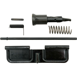 Disassembled firearm parts laid out: a barrel/receiver piece, coil spring, small pin, long rod, and a black stock/receiver housing.