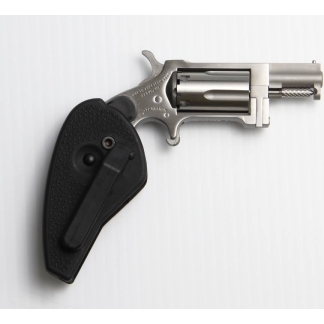Close-up of a silver revolver handgun with a black textured grip on a light background.