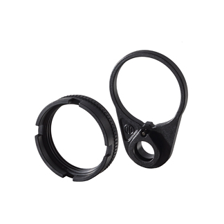 Two black circular rings, a lens mount adapter and a hoop-shaped clamp with a locking lever (camera accessory).