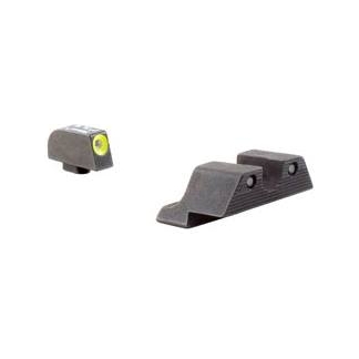 Two gray plastic hardware parts on a white background: a small block with a yellow circular insert and a larger curved-mount piece with a ridged base.