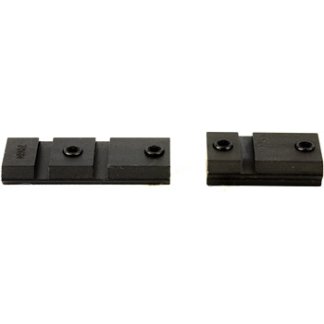 Two small black LEGO plates with studs, placed apart on a white background.