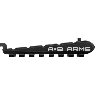 Close-up of a black firearm handguard/rail with the white logo 'A+B ARMS' and several mounting slots along the bottom.