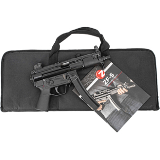 Black rifle with a magazine resting on a black zippered carrying case, accompanied by a product brochure