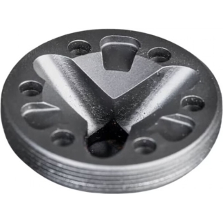 Round metal disc with a prominent X-shaped centerpiece and several small holes around the edge.